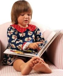Pre-reading skills include knowing how to handle books